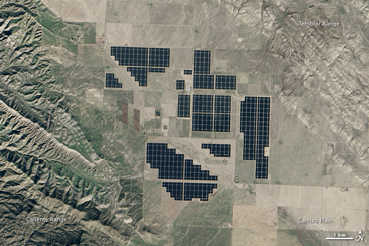 Industrial-scale solar generation: 550 MW Topaz Solar Farm, California (NASA/GSFC/USGS Landsat, 2015). Cuba's 49 solar parks are rated at 21.8 MW each.
